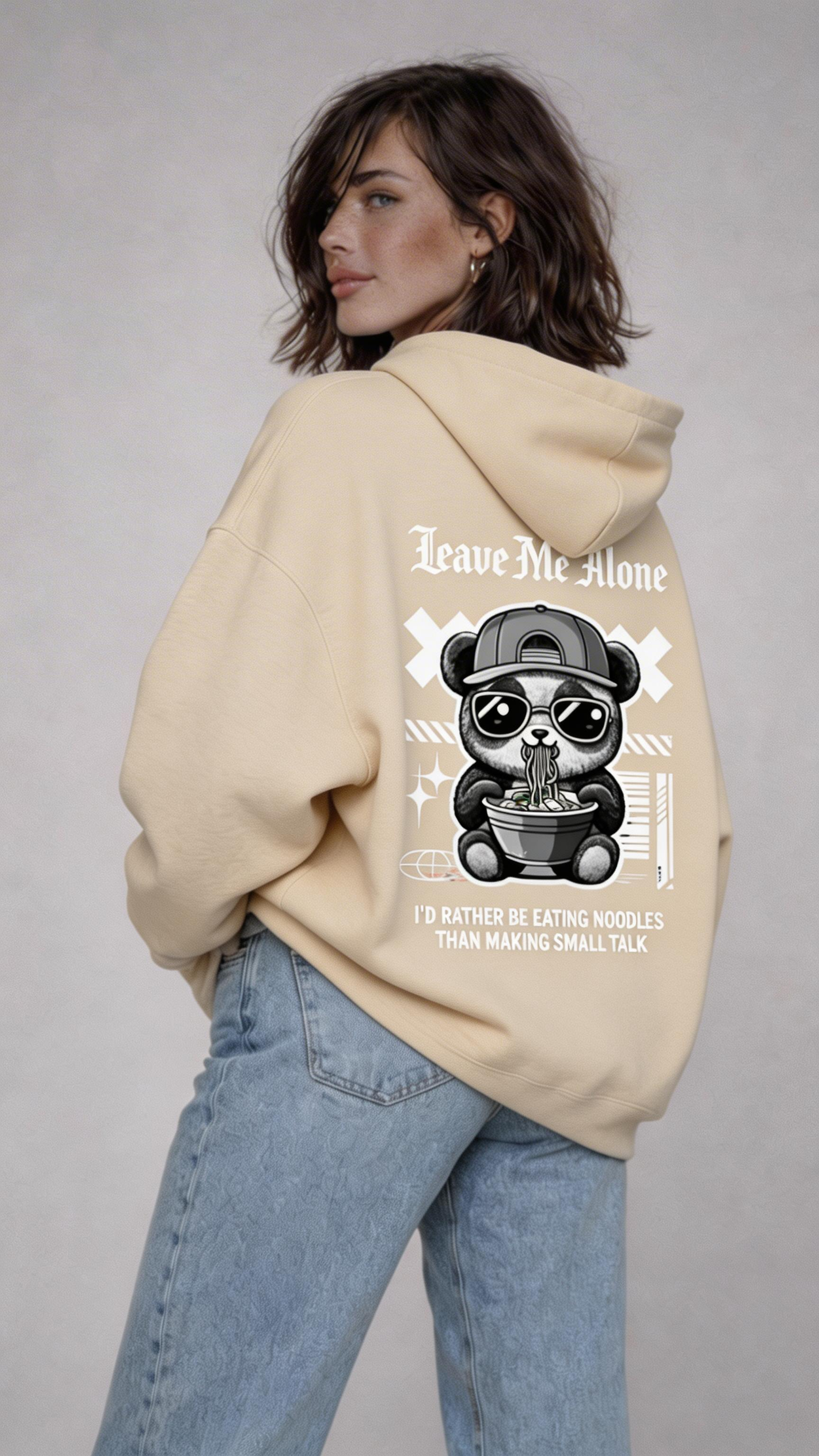 female model full body pose wearing oversized beige graphic streetwear hoodie gothic teddy bear graphic urban streetwear outfit