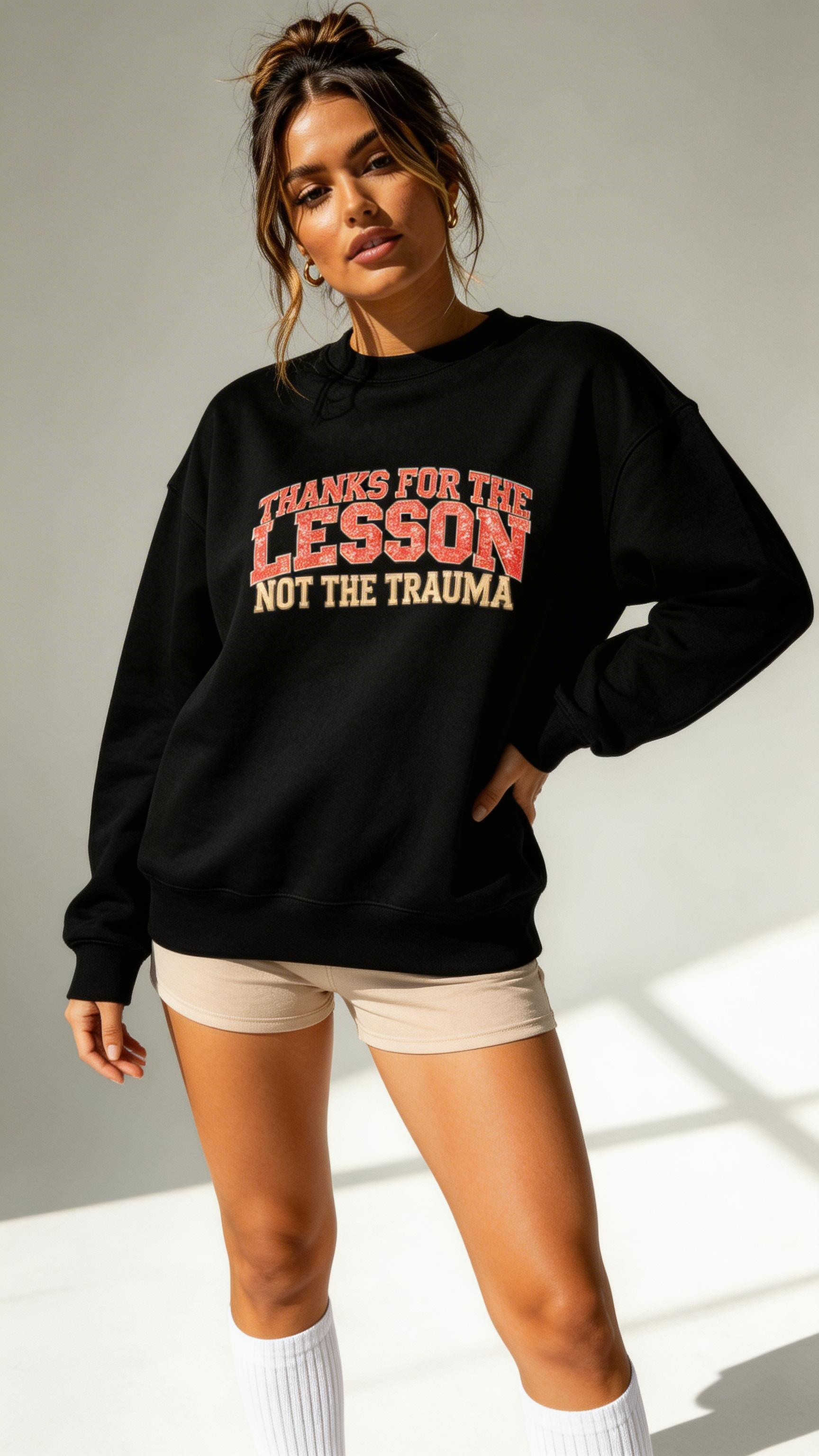 female model standing pose wearing oversized black graphic streetwear sweatshirt statement typography streetwear fashion