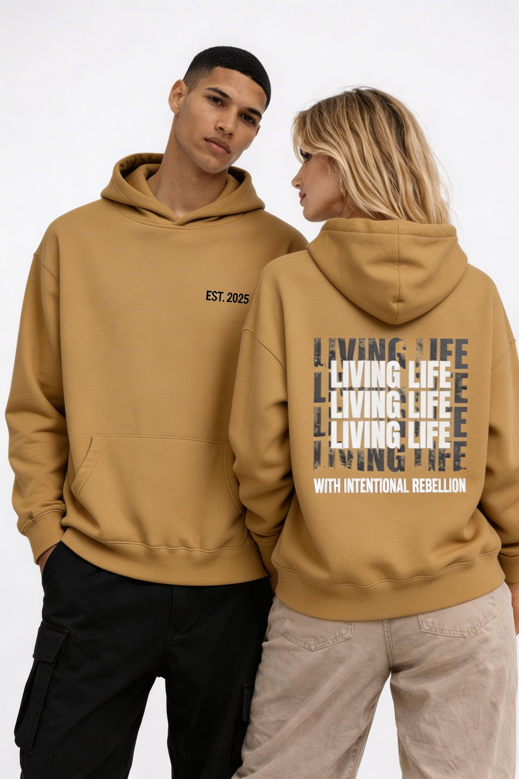 male and female models front and back pose wearing oversized brown streetwear hoodie noiré est 2025 and living life graphic design urban streetwear outfit