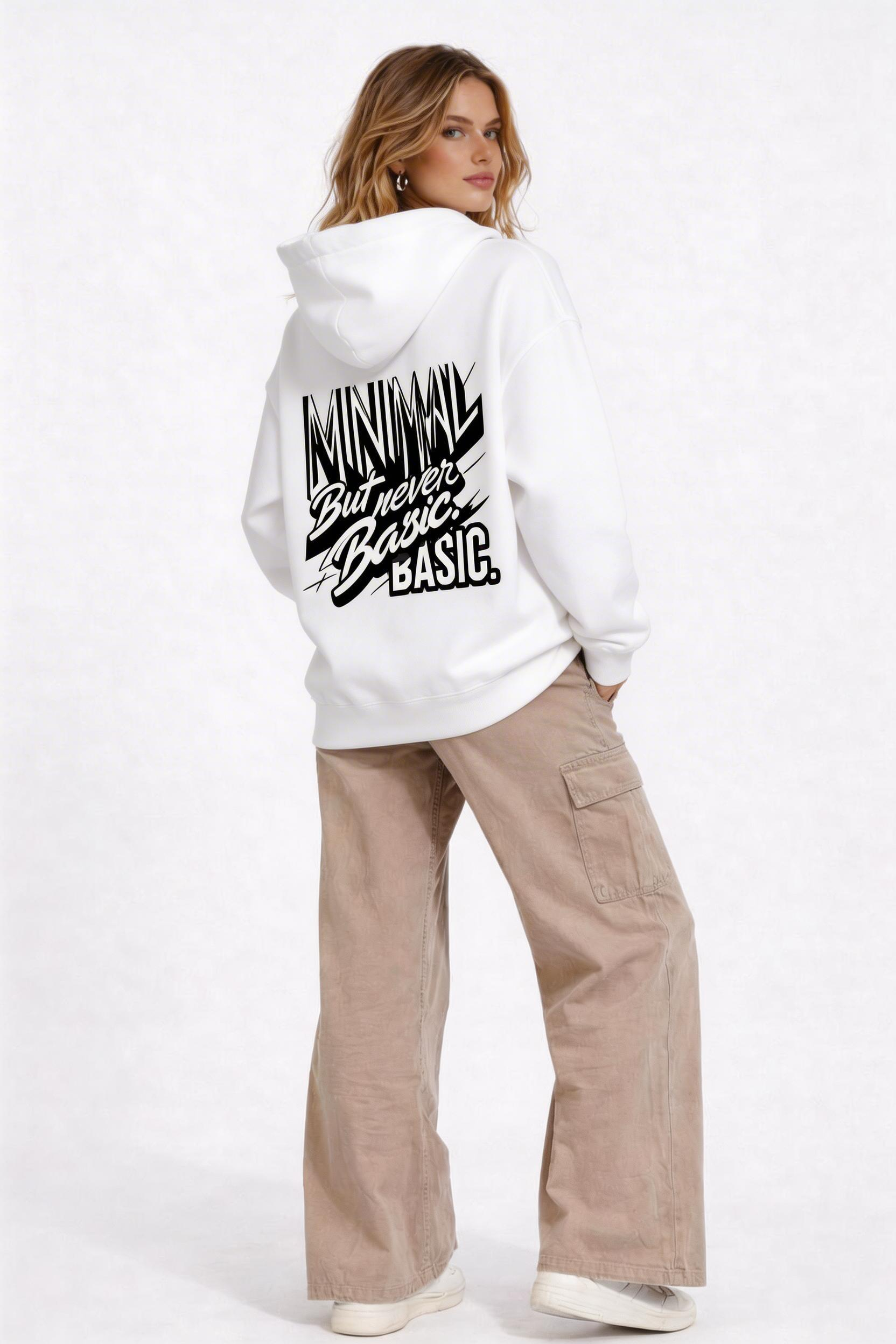 female model full body back pose wearing oversized white streetwear hoodie typography graphic design minimal but never basic outfit
