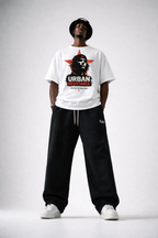 male model front pose wearing white oversized graphic t-shirt urban design modern streetwear fashion look