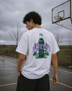 male model walking away on basketball court wearing relaxed white graphic tee nineties culture back print streetwear fashion