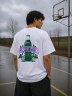 male model standing outdoor court wearing oversized white streetwear t shirt nineties culture vintage graphic urban streetwear