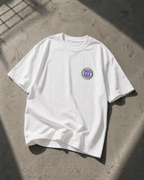 flat lay white oversized graphic t shirt 90s era chest logo retro streetwear fashion
