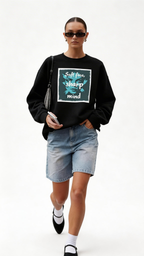 female model walking clean studio wearing black oversized sweatshirt soft face sharp mind graphic minimal streetwear look