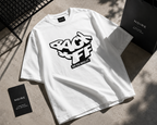 flat lay angled view oversized white graphic t shirt back off statement print urban streetwear outfit