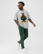 model walking pose wearing relaxed fit heather grey graphic tee with futuristic street royalty design graphic streetwear