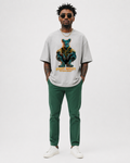 model front view wearing oversized light grey streetwear t shirt with neon animal graphic urban streetwear outfit