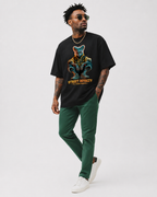model walking pose wearing oversized black graphic tee with neon animal design graphic streetwear