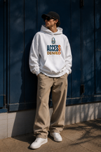 male model full body pose in oversized white hoodie beige baggy pants and sunglasses contemporary streetwear fashion