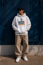 oversized white graphic hoodie with access denied design styled in urban editorial mens streetwear photoshoot