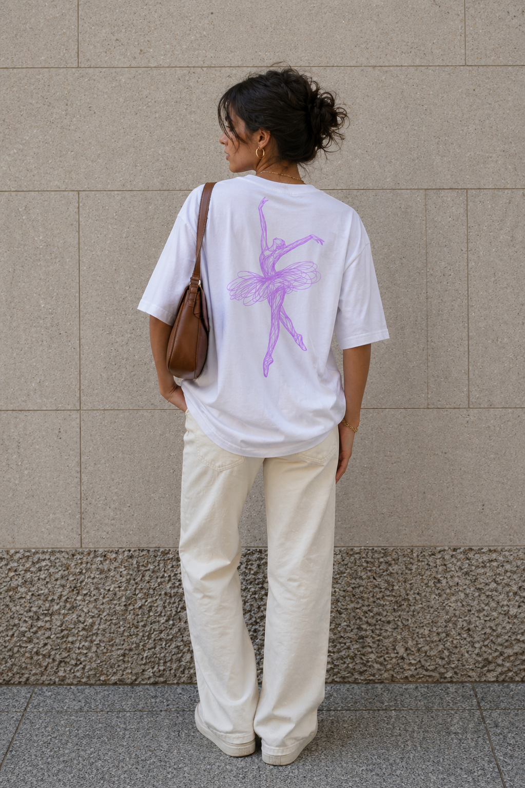 back view model wearing oversized white ballerina graphic t-shirt with pastel purple ballerina sketch back print streetwear fashion