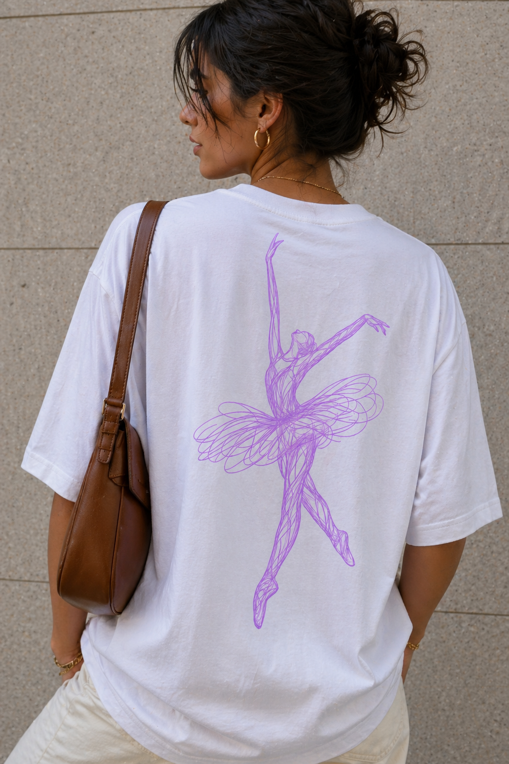 close up back view oversized white graphic t-shirt featuring pastel purple ballerina illustration design graphic streetwear