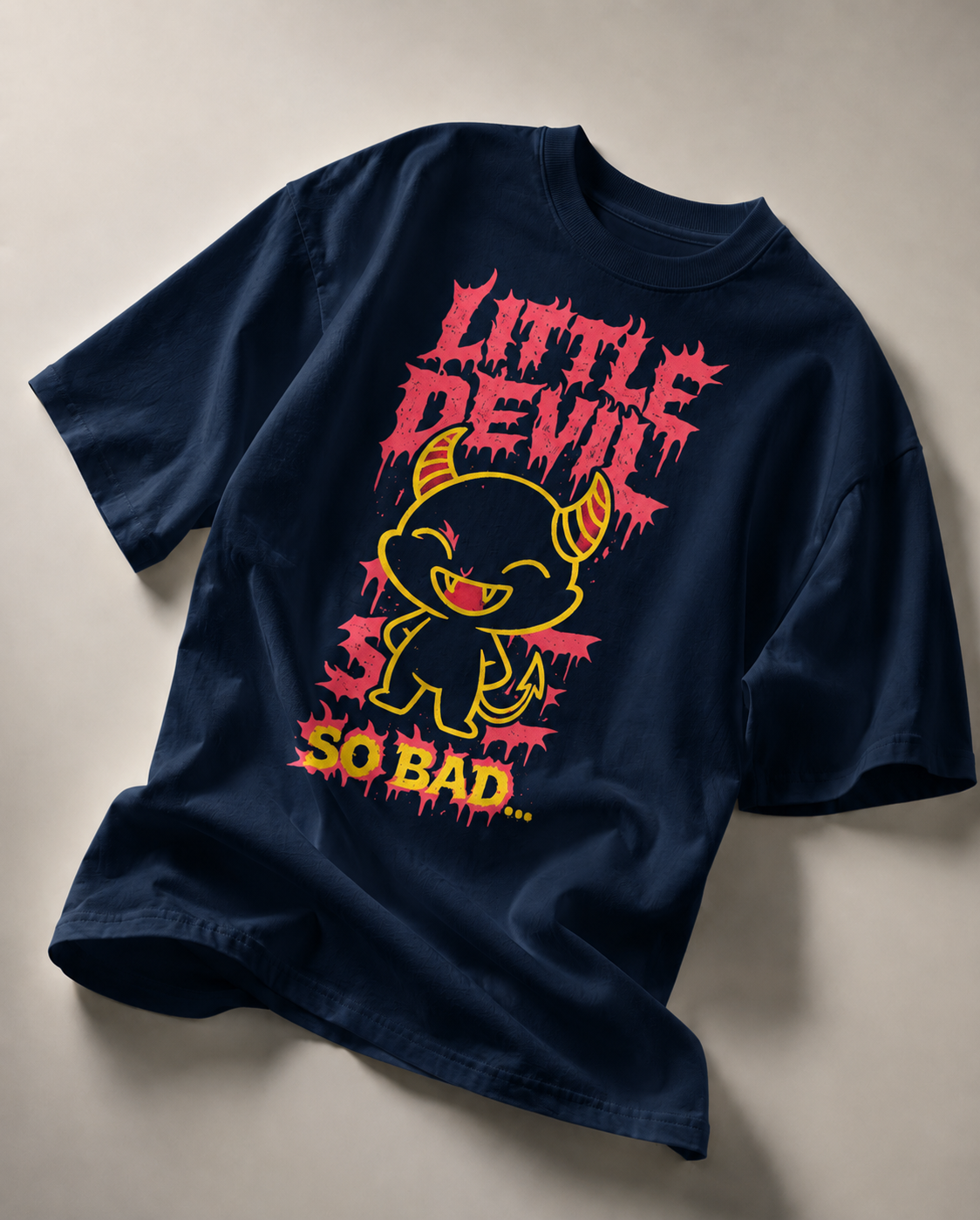 navy blue oversized graphic t shirt with little devil character design and vibrant red yellow print streetwear fashion