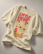 sand beige oversized graphic t shirt with little devil cartoon print and bold graphic lettering relaxed urban streetwear look