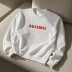 flat lay front view white oversized ballerina sweatshirt red statement logo minimalist streetwear fashion