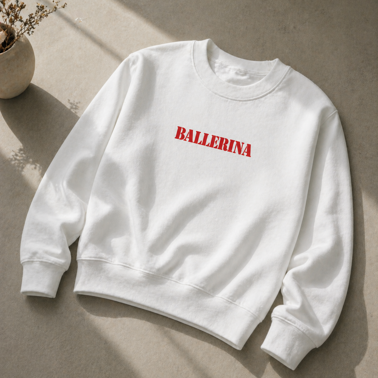 flat lay front white ballerina statement sweatshirt red typography graphic streetwear fashion