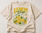 product flat lay front view beige oversized graphic t shirt lemon drop summer edition lemonade design streetwear fashion