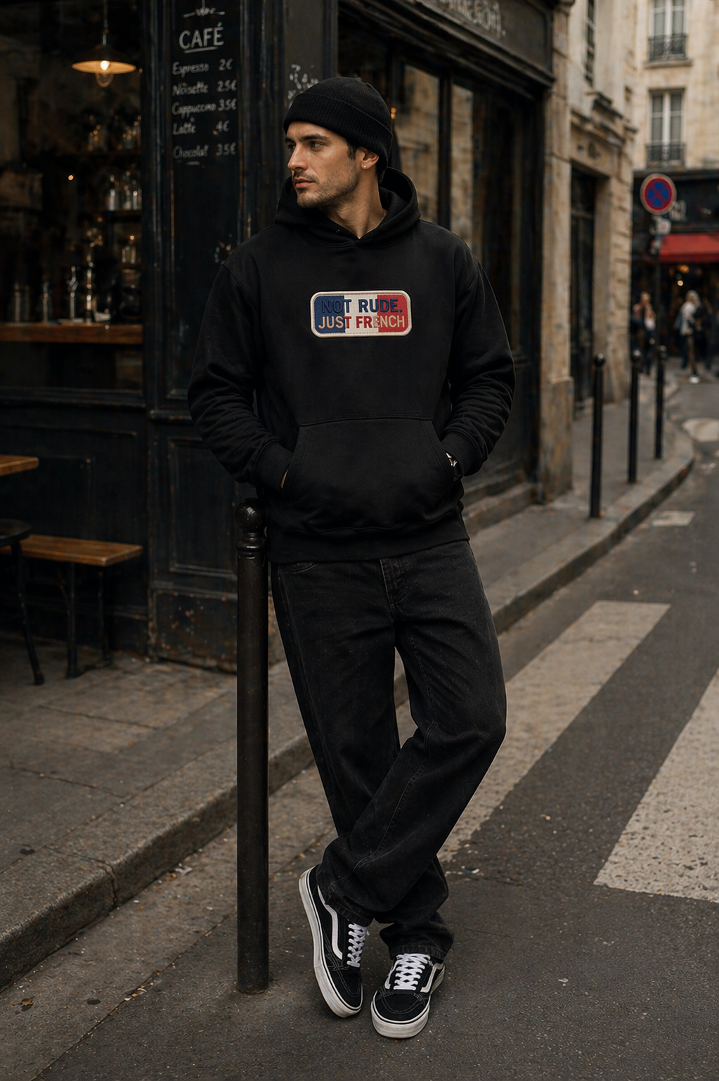 model leaning pose wearing oversized black hoodie streetwear outfit paris streetwear fashion