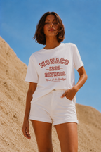 model standing pose wearing relaxed white graphic t shirt monaco monte carlo heritage urban streetwear outfit