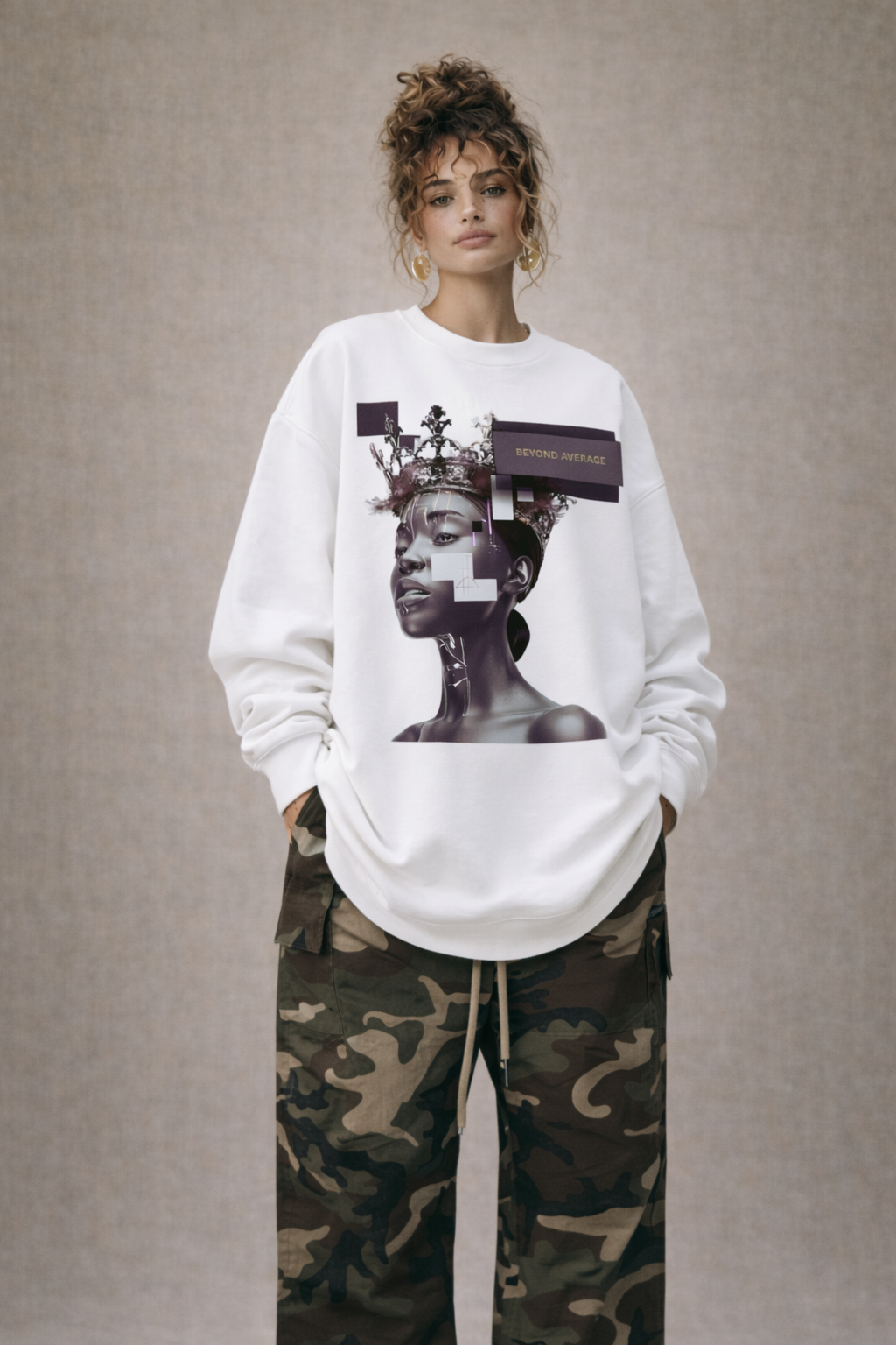 Female model wearing white oversized graphic sweatshirt with purple portrait design, minimalist streetwear fashion.