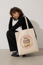 model sitting pose wearing beige canvas tote bag kawaii bubble tea design sweet day illustration lifestyle streetwear fashion