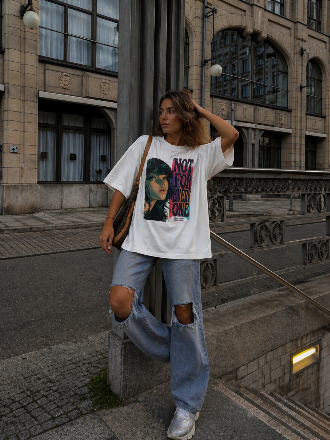 model pose hand in hair wearing oversized white graphic t-shirt not for everyone print streetwear fashion
