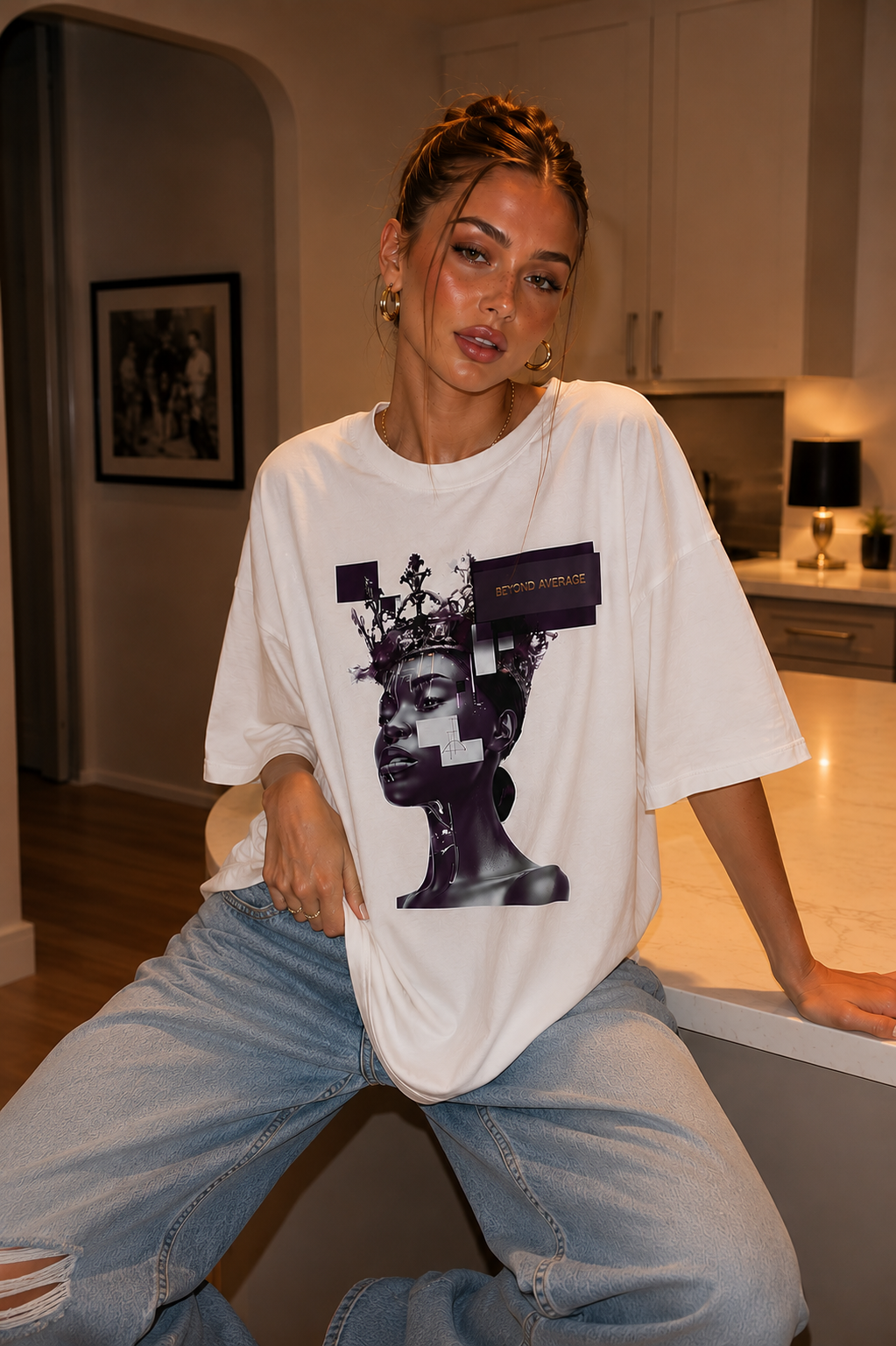 woman sitting casually in modern kitchen wearing oversized white graphic t shirt cyber portrait design graphic streetwear