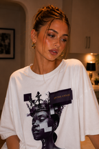 woman close up wearing oversized white graphic t shirt beyond average cyber queen artwork graphic streetwear