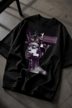 oversized black graphic t shirt lifestyle flat lay on fabric surface beyond average cyber queen graphic streetwear fashion