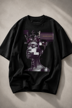 oversized black graphic t shirt flat lay on stone surface featuring beyond average cyber queen artwork graphic streetwear