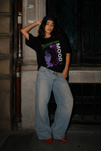 model full body pose wearing oversized black graphic t shirt anime mood design graphic streetwear outfit