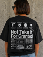 back detail model wearing oversized black graphic t-shirt statement back print graphic streetwear