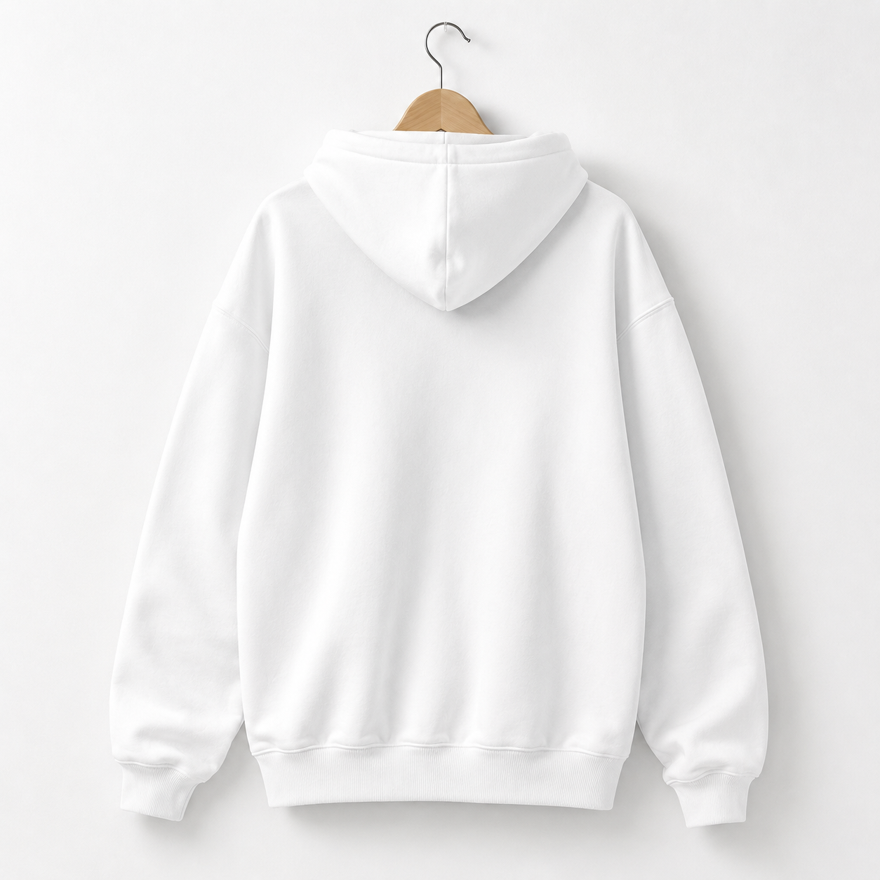 white oversized hoodie back view hanging on wooden hanger clean apparel mockup for streetwear brand