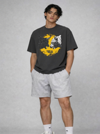 male model relaxed front view wearing oversized faded black graphic streetwear t shirt bull bear market graphic trend your friend streetwear fashion