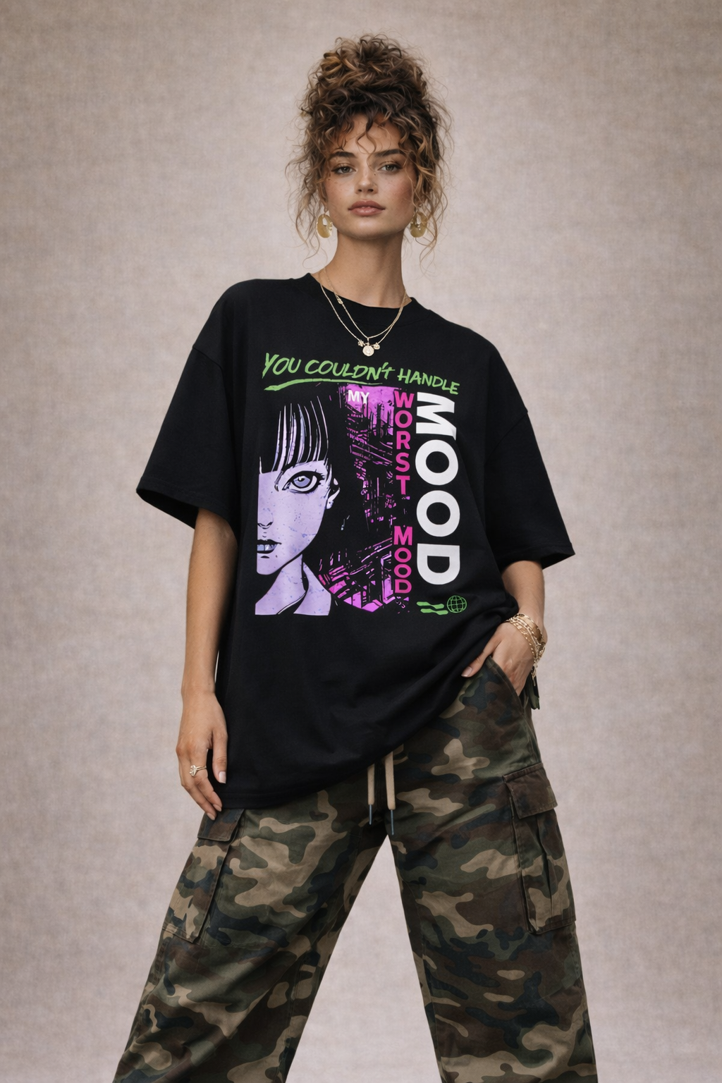 Female model in black oversized statement t-shirt featuring “My Worst Mood” vertical typography and anime-style graphic artwork, edgy urban streetwear look.