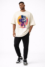 male model full body wearing oversized beige graphic streetwear t shirt astronaut boombox sunset design urban streetwear outfit