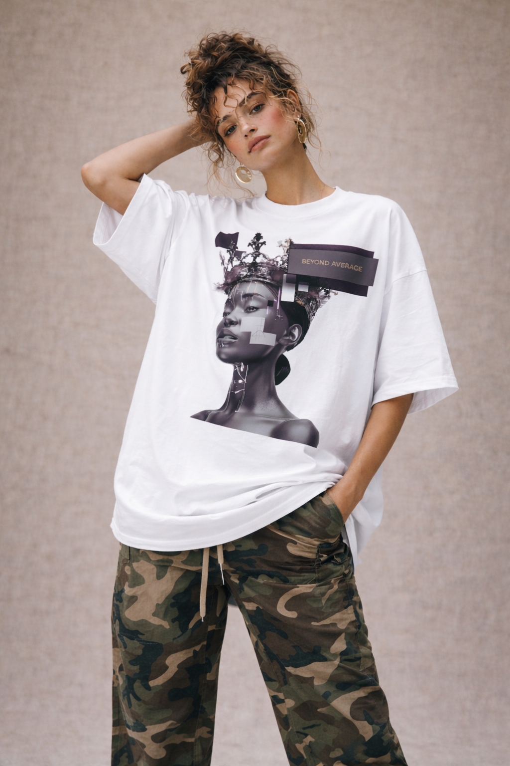 female model casual pose wearing oversized white graphic streetwear t shirt gothic statue design streetwear fashion