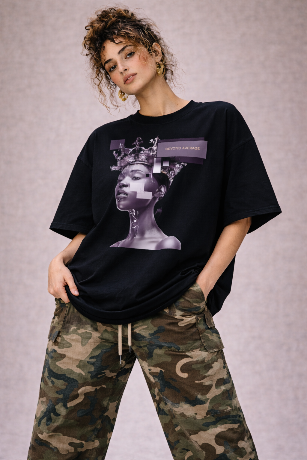 female model relaxed pose wearing oversized black graphic streetwear t shirt gothic statue graphic design streetwear fashion