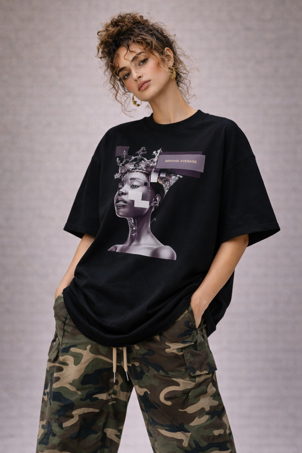 female model standing pose wearing oversized black graphic streetwear t shirt gothic statue design streetwear fashion