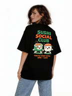 female model back pose wearing oversized black graphic streetwear t shirt sushi social club cartoon sushi graphic streetwear fashion