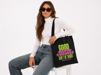 model seated front view wearing oversized black tote bag good taste attitude design urban streetwear outfit