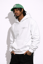 Noiré white oversized streetwear hoodie front view with bold letter Valentine gone bad, worn by male model, urban unisex hoodie.