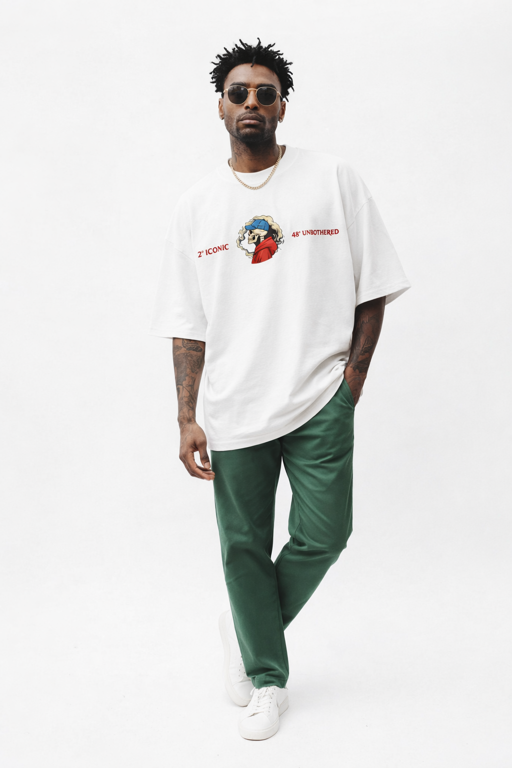 White Noiré oversized T-shirt with small front skull graphic and red accent, clean streetwear design.