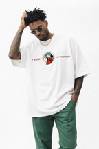 White Noiré oversized T-shirt with small front skull graphic and red accent, clean streetwear design.