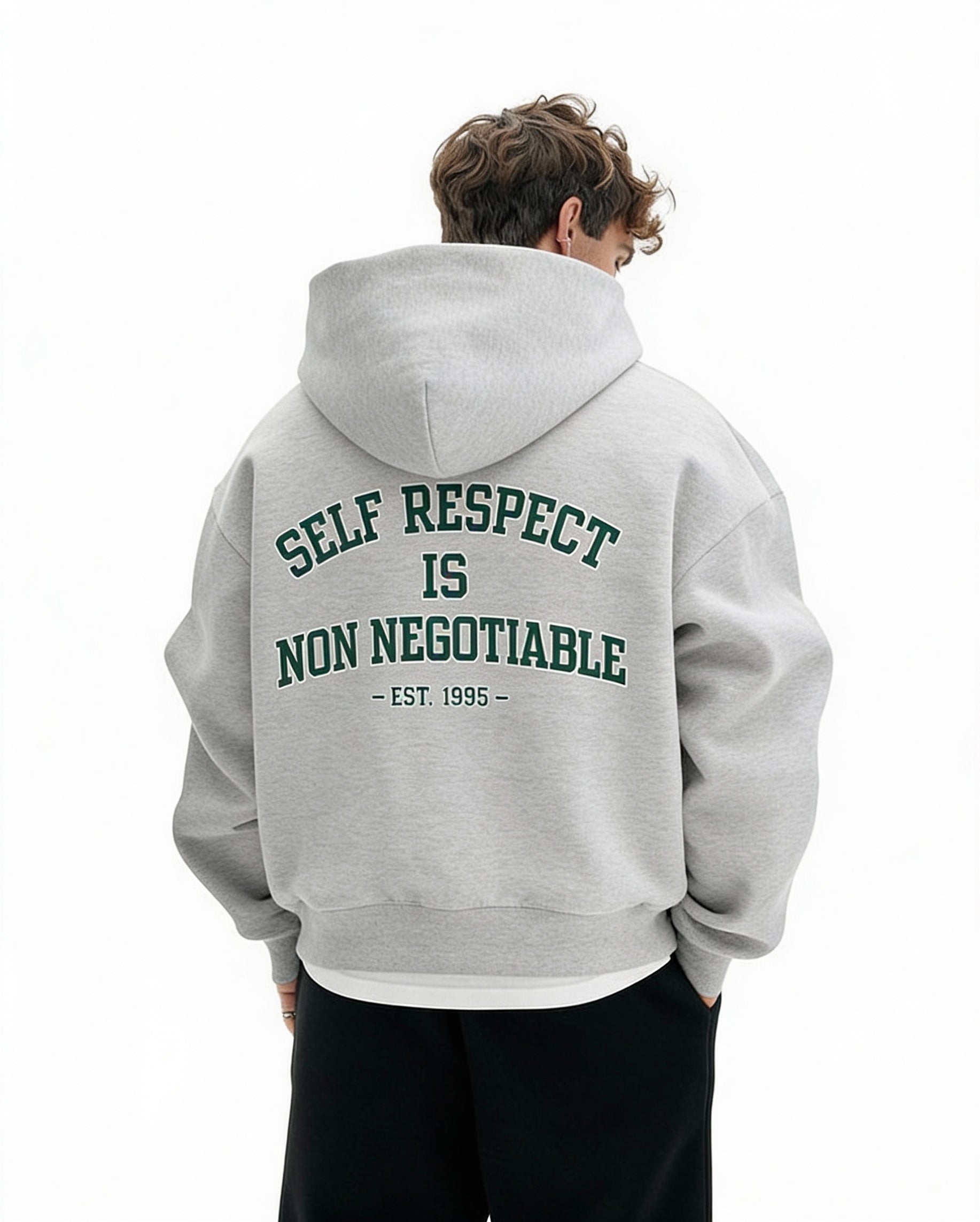 Grey oversized hoodie back view with green “Self Respect Is Non Negotiable – EST. 1995” varsity print, unisex streetwear hoodie