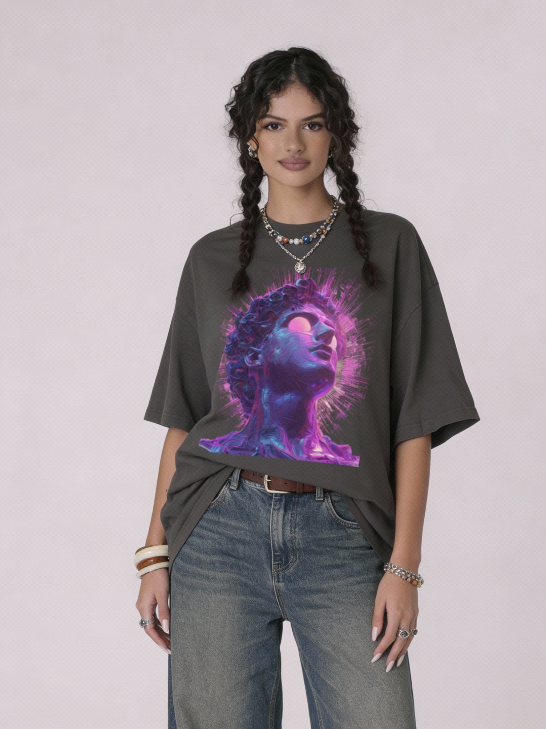 model wearing dark gray oversized unisex t-shirt front view with neon purple and pink female portrait graphic art
