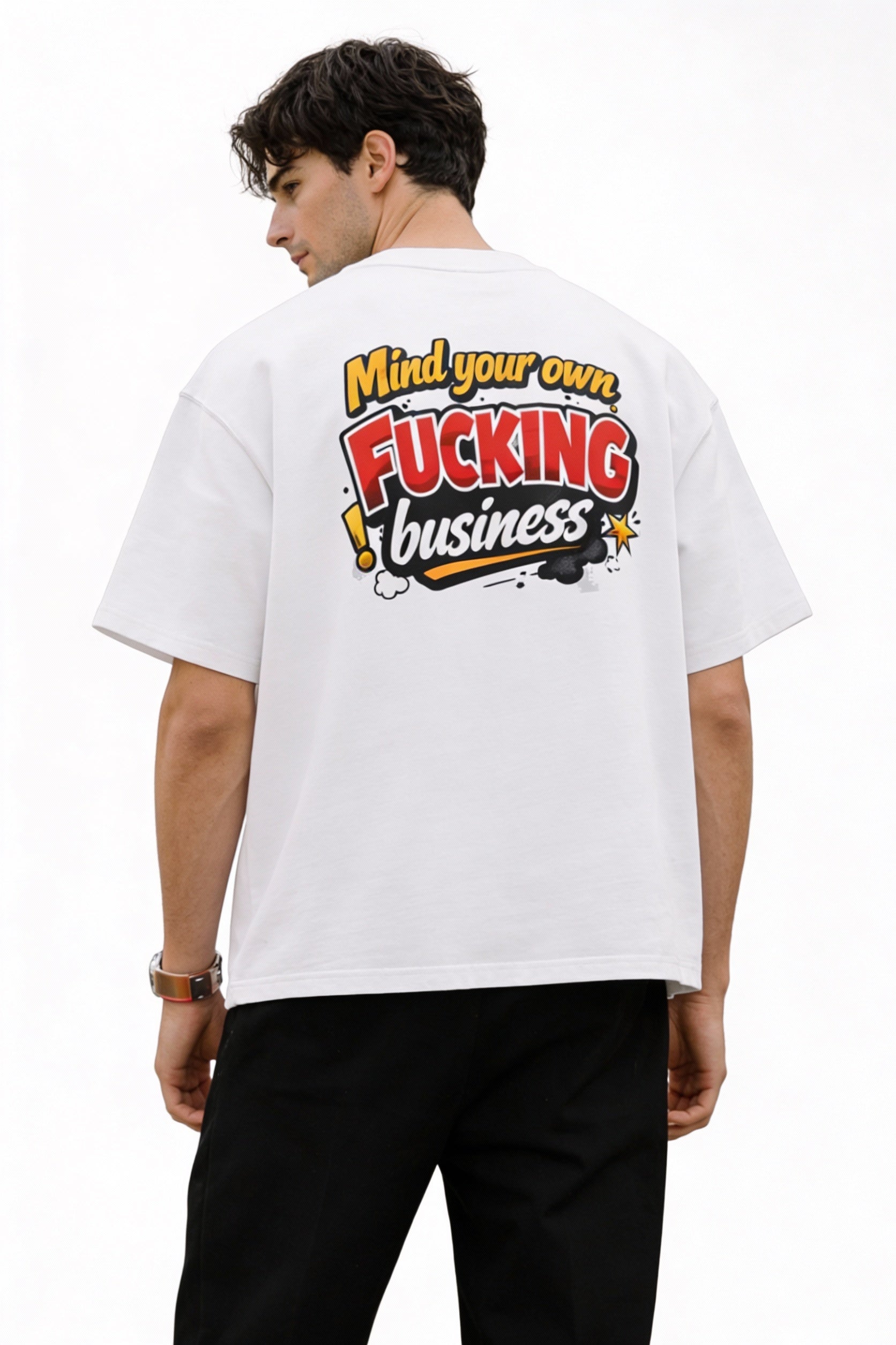 Back view of white oversized streetwear T-shirt with large “Mind Your Own F*cking Business” bold graphic print, relaxed fit on male model