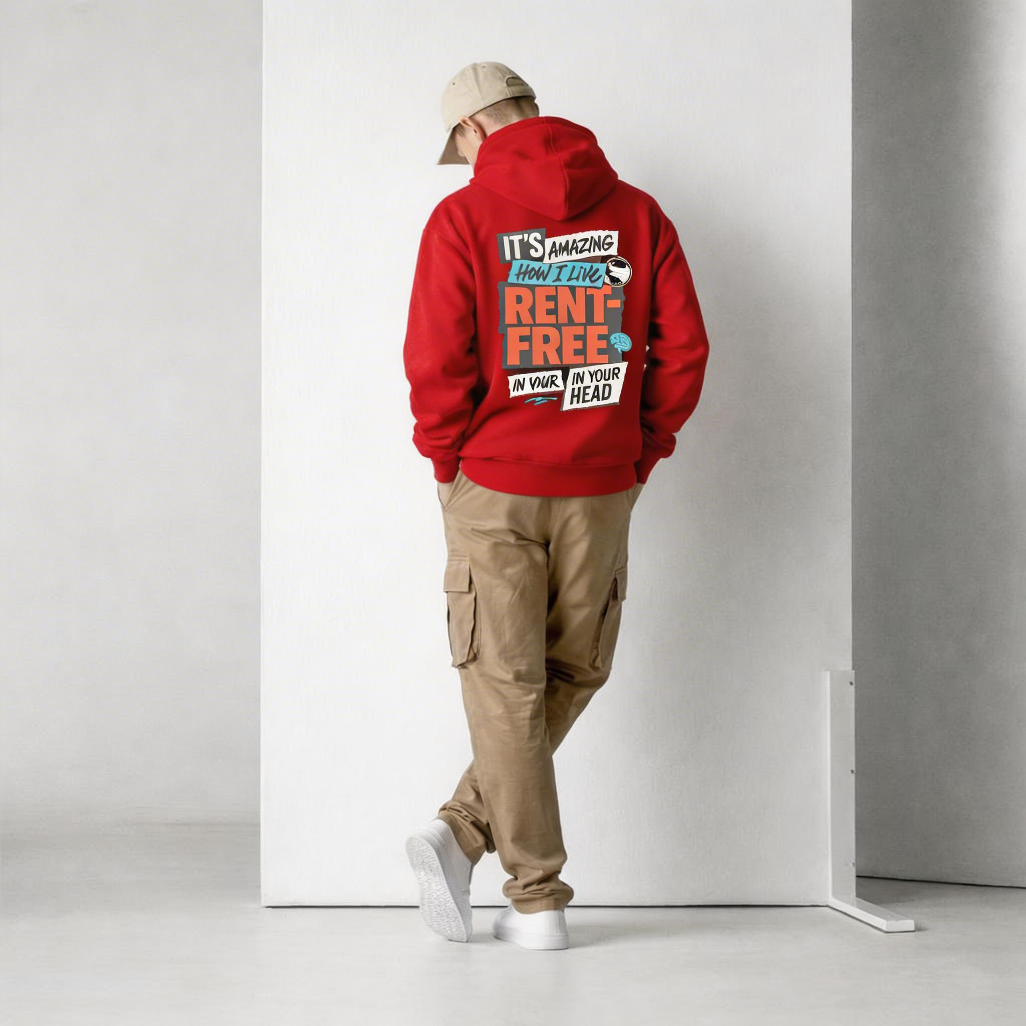 male model back view wearing oversized red hoodie with rent free typography graphic streetwear fashion
