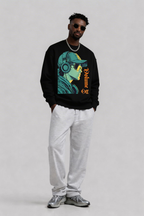 male model full body front view wearing oversized black graphic sweatshirt urban streetwear fashion look